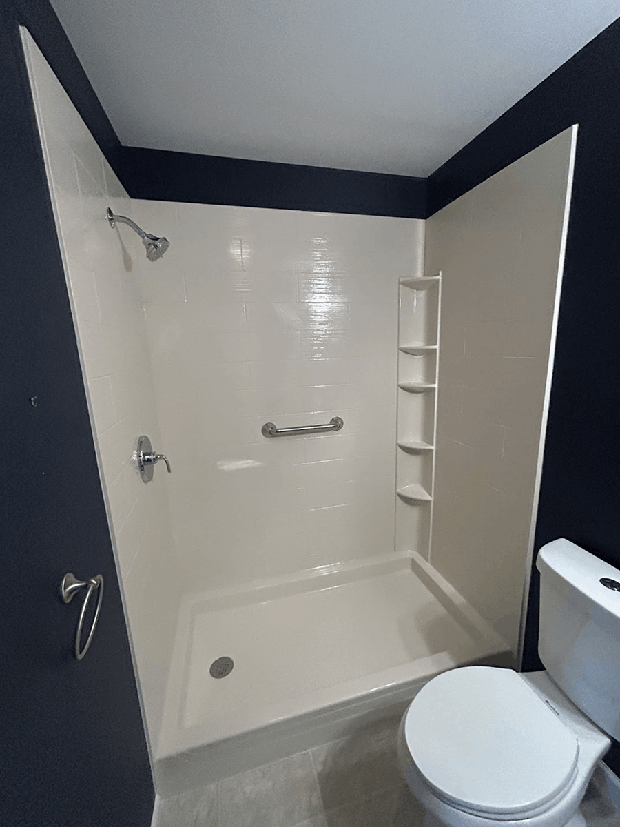 Bath Fitter of Erie Bath Conversion After Photo Navy Bathroom